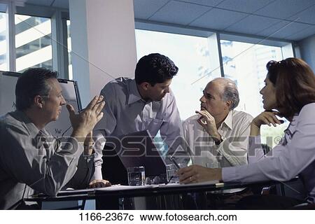 Stock Image - meeting, group, conference, business, businesspeople, Businesspeople conferring. Fotosearch