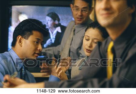 meeting, group, multiethnic, technology, computer, communications View Large Photo Image Stock Photo - meeting, group, multiethnic, technology, computer, communications. Fotosearch