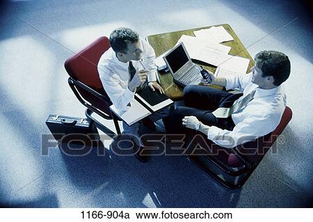 meeting, men, telephone, table, consultation, talking, paperwork View Large Photo Image Stock Image - meeting, men, telephone, table, consultation, talking, paperwork. Fotosearch