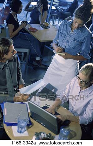 meeting, multiethnic, computer, laptop, typing, business, restaurant View Large Photo Image Stock Image - meeting, multiethnic, computer, laptop, typing, business, restaurant. Fotosearch