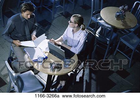 meeting, overhead, night, talking, discussion, papers, computer View Large Photo Image Stock Image - meeting, overhead, night, talking, discussion, papers, computer. Fotosearch
