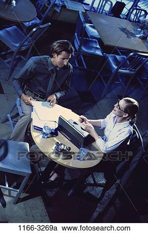 meeting, overhead, night, talking, discussion, conversation, computer View Large Photo Image Stock Image - meeting, overhead, night, talking, discussion, conversation, computer. Fotosearch