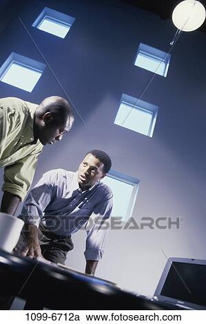 men, desk, business, businessmen, office, indoors View Large Photo Image Stock Image - men, desk, business, businessmen, office, indoors. Fotosearch