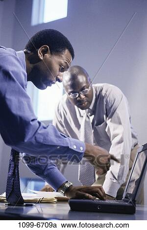 men, desk, computer, laptop, business, businessmen View Large Photo Image Stock Image - men, desk, computer, laptop, business, businessmen. Fotosearch
