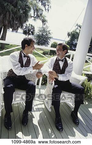 men, people, formal, talking, sitting, Hispanic, laughing View Large Photo Image Stock Image - men, people, formal, talking, sitting, Hispanic, laughing. Fotosearch