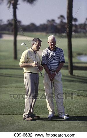 men, people, playing, golf, talking, senior, watch View Large Photo Image Stock Image - men, people, playing, golf, talking, senior, watch. Fotosearch