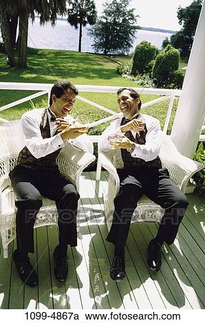 men, people, smiling, smoke, drinking, laughing, outdoors View Large Photo Image Stock Image - men, people, smiling, smoke, drinking, laughing, outdoors. Fotosearch