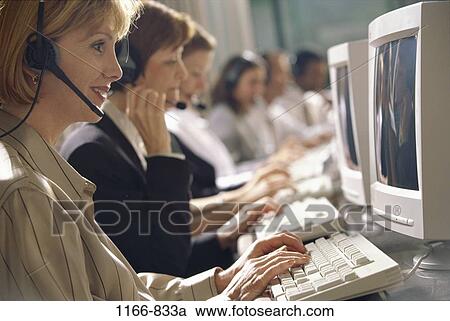 men, women, desk, business, computers, multi-tasking, center View Large Photo Image Stock Image - men, women, desk, business, computers, multi-tasking, center. Fotosearch
