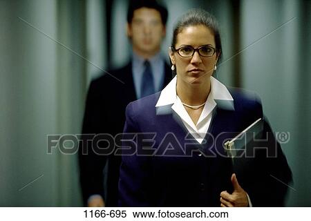 Stock Photography - multiethnic, blur, anger, folder, motion, carrying. Fotosearch