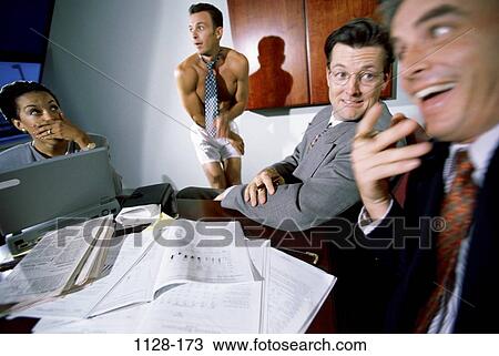 Stock Image - multiethnic, desk, business, concepts, defeat, metaphors, confrontation. Fotosearch