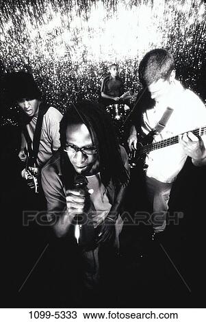multiethnic, men, people, playing, music, entertainment, teamwork View Large Photo Image Stock Image - multiethnic, men, people, playing, music, entertainment, teamwork. Fotosearch