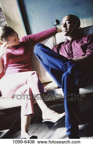 multiethnic, people, couple, indoors, young adult, Young couples indoors View Large Photo Image Stock Photo - multiethnic, people, couple, indoors, young adult, Young couples indoors. Fotosearch