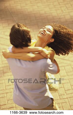 multiethnic, people, couple, outdoors, hugging, hug, young adult View Large Photo Image Stock Photo - multiethnic, people, couple, outdoors, hugging, hug, young adult. Fotosearch