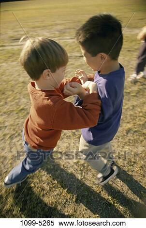 multiethnic, people, outdoors, children, boys, pushing, push View Large Photo Image Stock Photography - multiethnic, people, outdoors, children, boys, pushing, push. Fotosearch