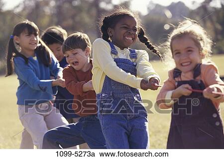 multiethnic, people, rope, outdoors, pulling, teamwork, children View Large Photo Image Stock Image - multiethnic, people, rope, outdoors, pulling, teamwork, children. Fotosearch