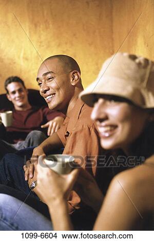 multiethnic, people, smiling, hat, coffee, drinking, cafe View Large Photo Image Picture - multiethnic, people, smiling, hat, coffee, drinking, cafe. Fotosearch