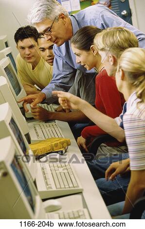 multiethnic, people, teacher, school, pointing, point, contemplation View Large Photo Image Stock Image - multiethnic, people, teacher, school, pointing, point, contemplation. Fotosearch