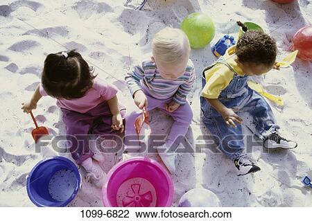 multiethnic, sand, overhead, people, playing, sitting, playground View Large Photo Image Stock Image - multiethnic, sand, overhead, people, playing, sitting, playground. Fotosearch