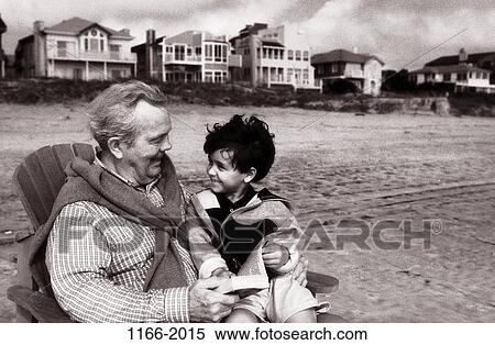 multiethnic, sand, people, sitting, reading, beach, houses View Large Photo Image Stock Photography - multiethnic, sand, people, sitting, reading, beach, houses. Fotosearch