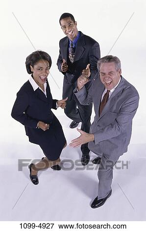 multiethnic, success, business, achievement, humor, indoors, trio View Large Photo Image Stock Photo - multiethnic, success, business, achievement, humor, indoors, trio. Fotosearch