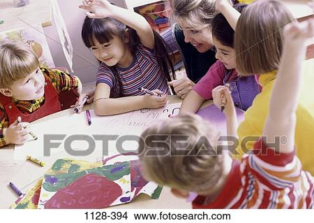 multiethnic, table, teacher, school, coloring, worker View Large Photo Image Picture - multiethnic, table, teacher, school, coloring, worker. Fotosearch