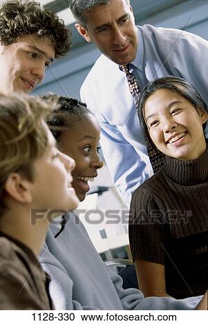 multiethnic, teacher, classroom, achievement, surprise, education, class View Large Photo Image Stock Image - multiethnic, teacher, classroom, achievement, surprise, education, class. Fotosearch