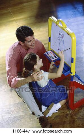 overhead, people, painting, creative, family, creating, father View Large Photo Image Stock Photo - overhead, people, painting, creative, family, creating, father. Fotosearch