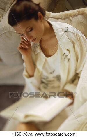 overhead, people, woman, Hispanic, reading, couch, book View Large Photo Image Stock Image - overhead, people, woman, Hispanic, reading, couch, book. Fotosearch