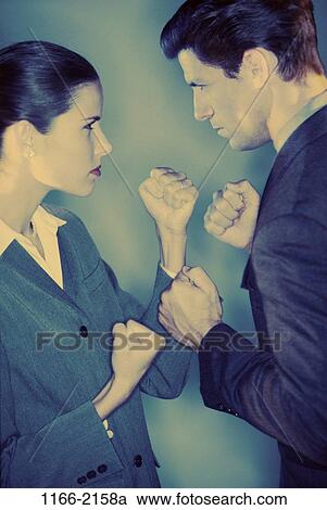 Stock Image - people, anger, profile, business, confrontation, violence, mad. Fotosearch