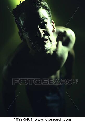 people, angry, brunette, scowl, indoors View Large Photo Image Stock Image - people, angry, brunette, scowl, indoors. Fotosearch