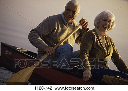 people, autumn, couple, senior, boating, sports, boat View Large Photo Image Stock Image - people, autumn, couple, senior, boating, sports, boat. Fotosearch