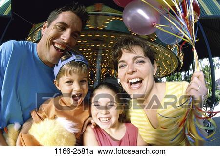 people, balloons, laughing, motion, carnival, outdoors, speed View Large Photo Image Stock Image - people, balloons, laughing, motion, carnival, outdoors, speed. Fotosearch