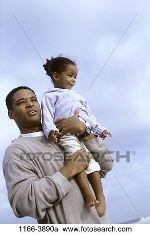 people, beach, holding, carrying, family, father, daughter View Large Photo Image Stock Image - people, beach, holding, carrying, family, father, daughter. Fotosearch