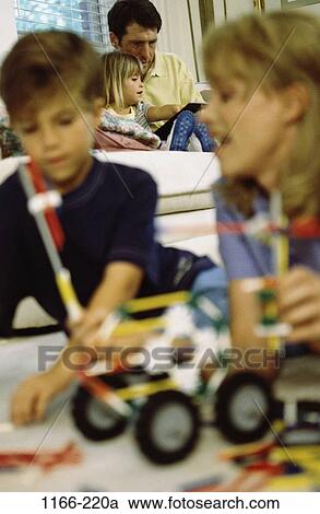 people, blur, playing, reading, family, play, toys View Large Photo Image Stock Image - people, blur, playing, reading, family, play, toys. Fotosearch