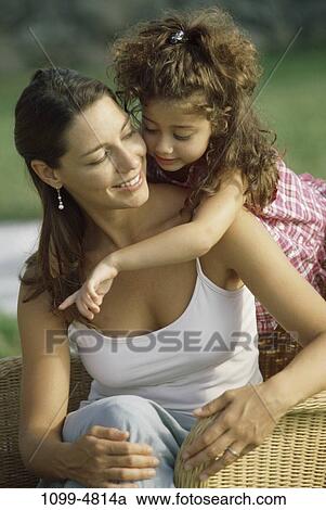 people, chair, sitting, mother, Hispanic, pointing, leaning View Large Photo Image Stock Image - people, chair, sitting, mother, Hispanic, pointing, leaning. Fotosearch