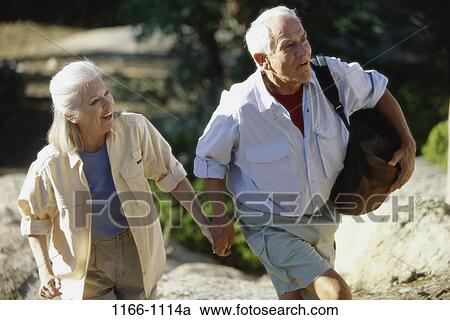 people, climbing, couple, senior, backpack, outdoors, adventurous View Large Photo Image Stock Image - people, climbing, couple, senior, backpack, outdoors, adventurous. Fotosearch