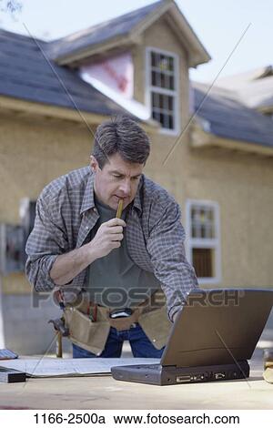 people, construction, computer, laptop, outdoors, Middle-aged View Large Photo Image Stock Image - people, construction, computer, laptop, outdoors, Middle-aged. Fotosearch