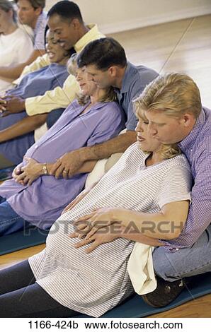 Stock Image - people, couple, family, pregnancy, parents, Pregnant parents. Fotosearch
