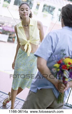 people, couple, Hispanic, flowers, outdoors, curious, surprise View Large Photo Image Stock Image - people, couple, Hispanic, flowers, outdoors, curious, surprise. Fotosearch