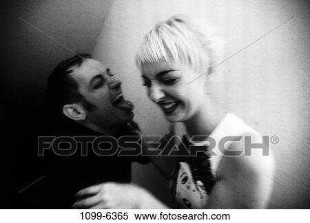 Stock Photography - people, couple, laughing, hug, black and white, joy. Fotosearch