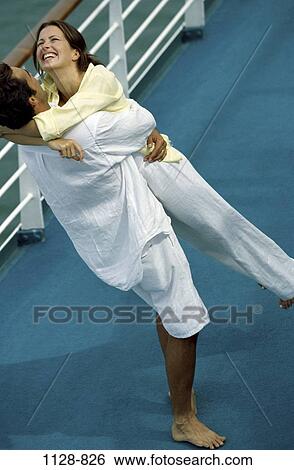 Stock Photograph - people, couple, ship, outdoors, twirling, transportation, tourism. Fotosearch