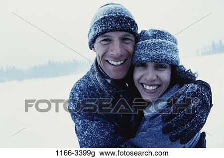 people, couple, winter, outdoors, young adult, Young couples outdoors winter View Large Photo Image Stock Image - people, couple, winter, outdoors, young adult, Young couples outdoors winter. Fotosearch