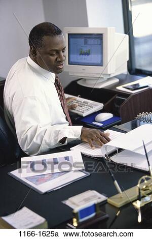 people, desk, paperwork, busy, papers, computer View Large Photo Image Stock Image - people, desk, paperwork, busy, papers, computer. Fotosearch