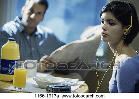 people, eating, glass, headset, morning, newspaper View Large Photo Image Stock Image - people, eating, glass, headset, morning, newspaper. Fotosearch