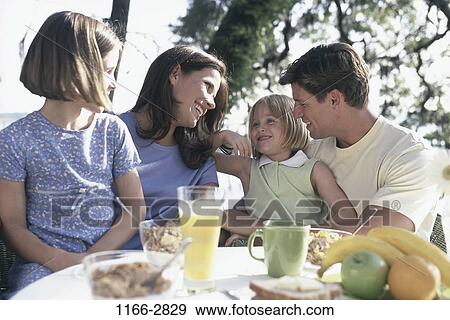 people, eating, glass, morning, talking, coffee View Large Photo Image Stock Photo - people, eating, glass, morning, talking, coffee. Fotosearch