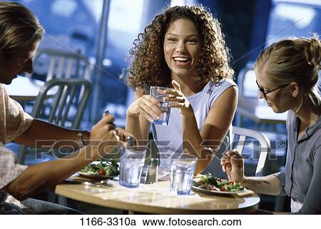people, eating, smiling, drinking, friends, restaurant, smile View Large Photo Image Stock Image - people, eating, smiling, drinking, friends, restaurant, smile. Fotosearch