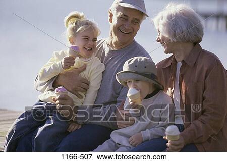 people, eating, smiling, hats, ice cream, laughing View Large Photo Image Stock Photo - people, eating, smiling, hats, ice cream, laughing. Fotosearch