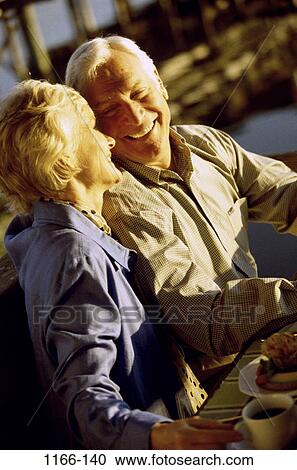 people, eating, wisdom, couple, senior, laughing, outdoors View Large Photo Image Stock Image - people, eating, wisdom, couple, senior, laughing, outdoors. Fotosearch