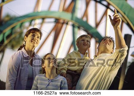 people, excitement, pointing, carnival, outdoors, park, amusement View Large Photo Image Stock Image - people, excitement, pointing, carnival, outdoors, park, amusement. Fotosearch
