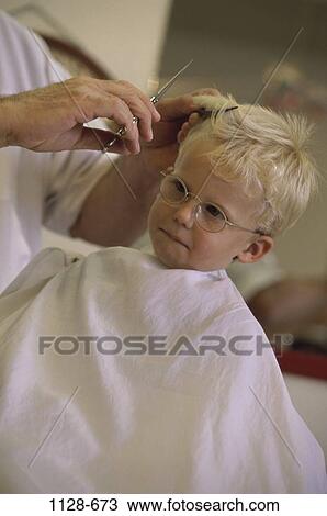 Stock Image - people, eyeglasses, boy, child, blond, frightened, cutting. Fotosearch